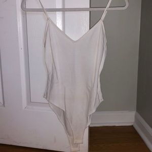 Forever 21 white body suit with crossing